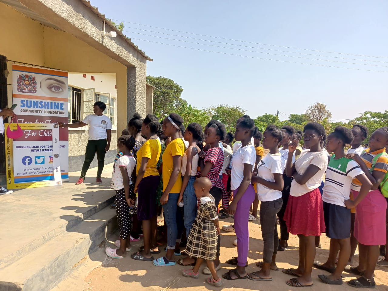 Families queuing at a free eye-testing camp